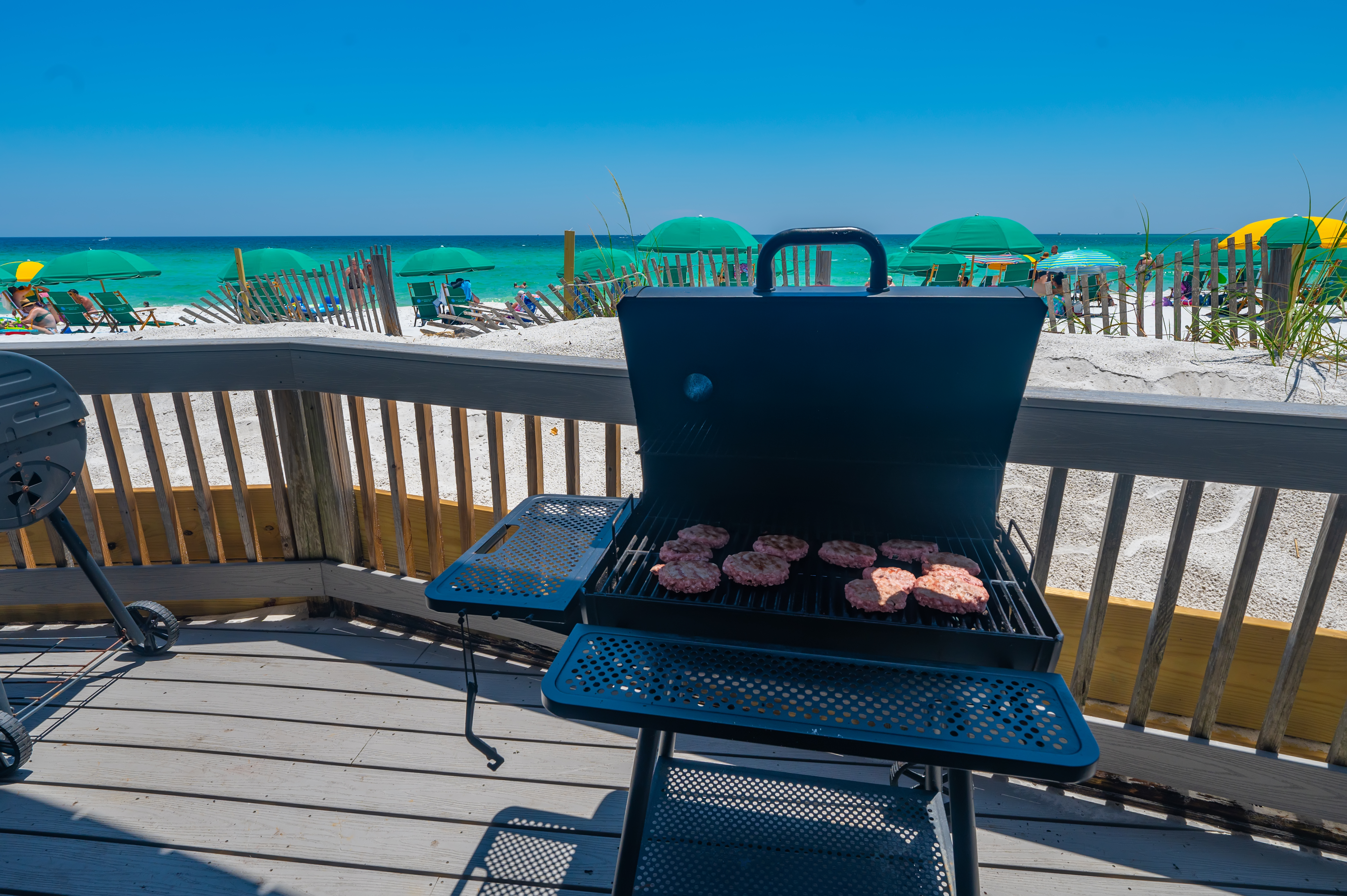 community charcoal grills at beach pavilion